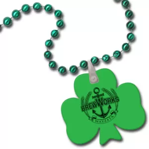 green beads with clover-shaped disk